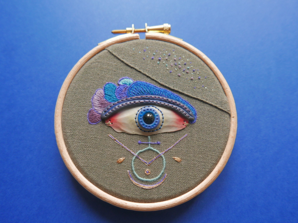 eye on a wooden hoop